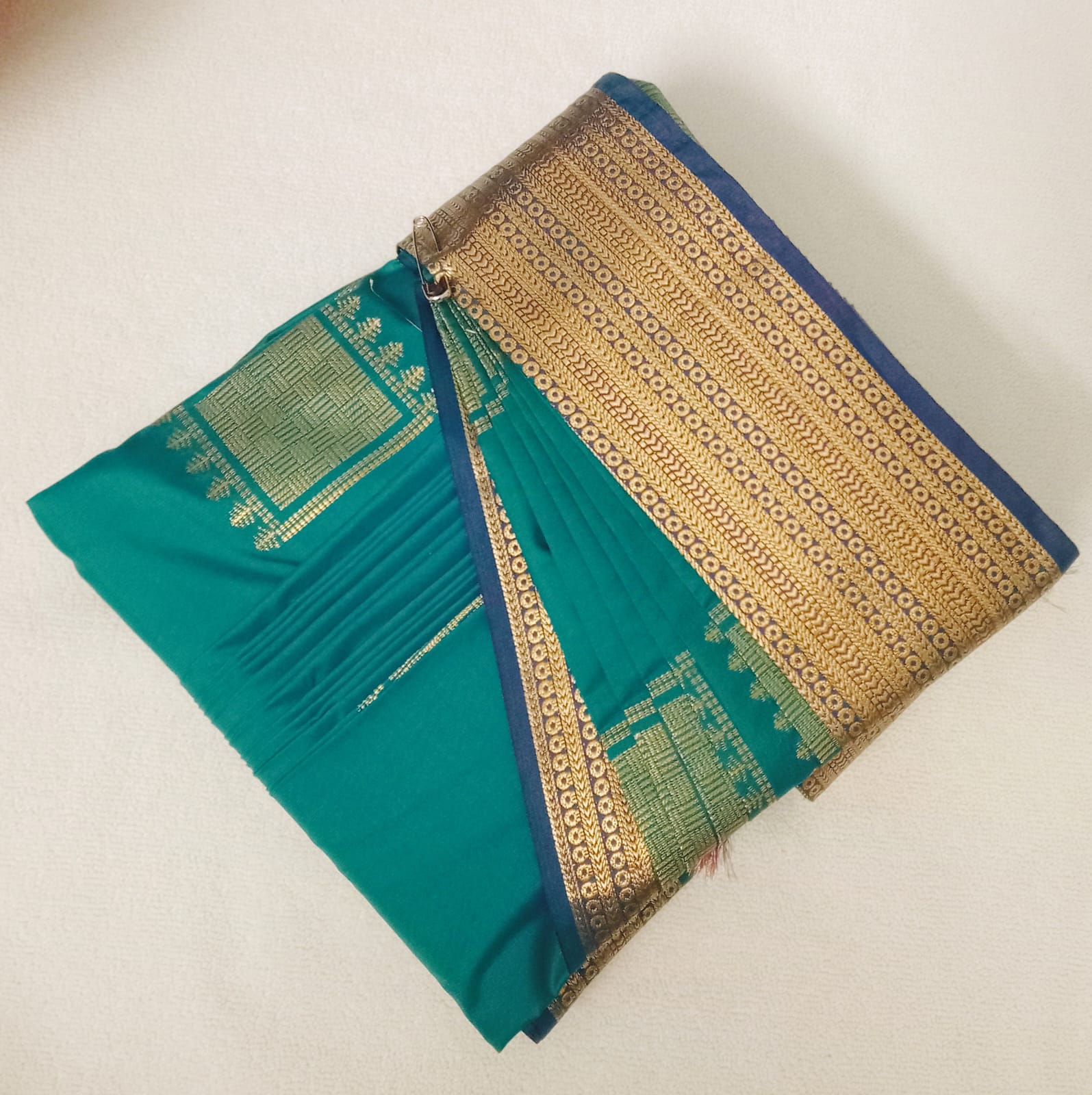 Gallery 4: Richly colored silk saree drape detail.