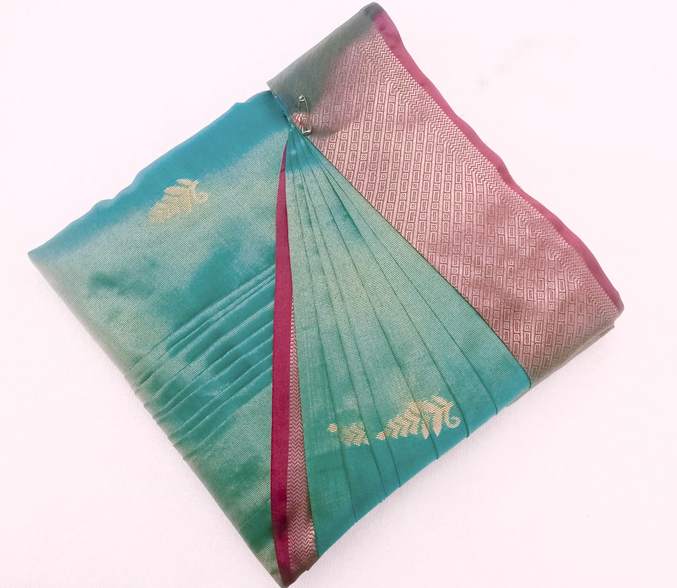 Gallery 5: Simple, elegant drape of a pastel cotton saree.
